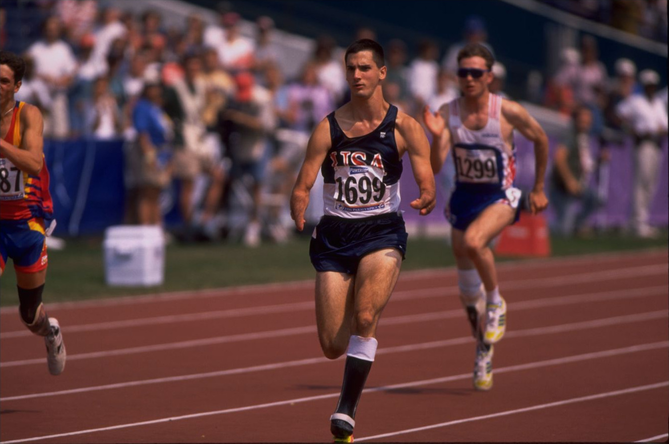 Tony Volpentest running clear of the field in a USA singlet